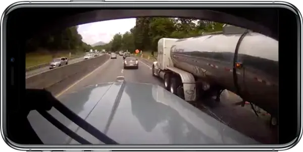 BIT dashcam footage showing a truck merging into another drivers lane
